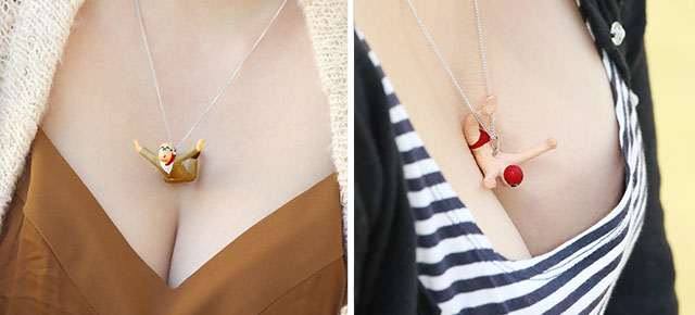 Funny Pendants With Tiny Figurines Diving Straight Into Women's Breasts