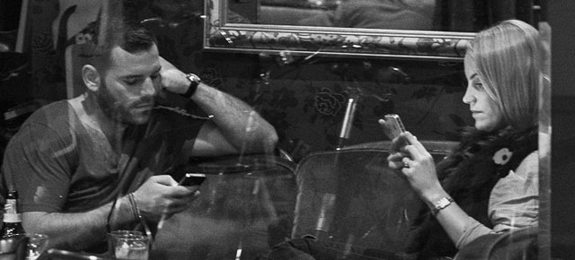 The Death Of Conversation: Photographer Captures People's Obsession With Their Phones 