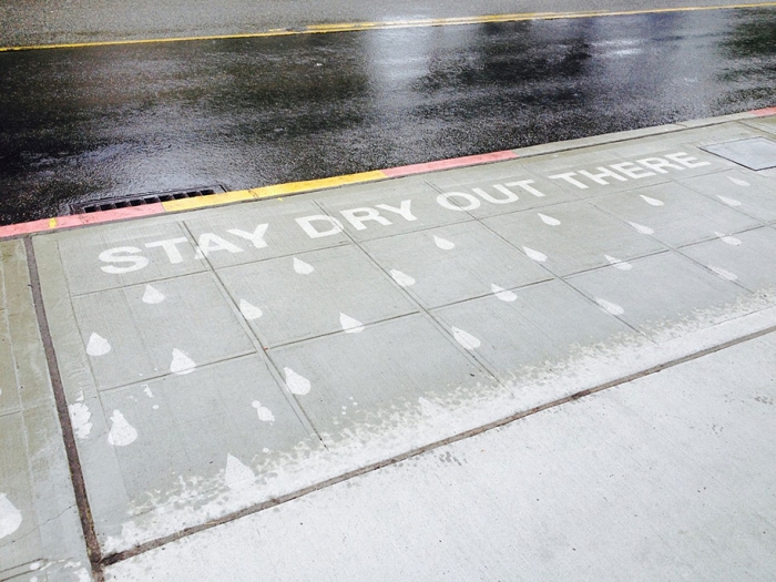 hydrophobic-sidewalk-graffiti-rainworks-peregrine-church-seattle-2