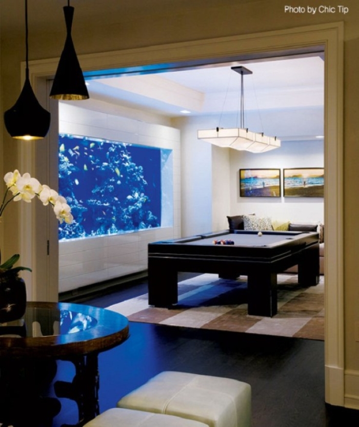 Basement remodel with aquarium and pool table