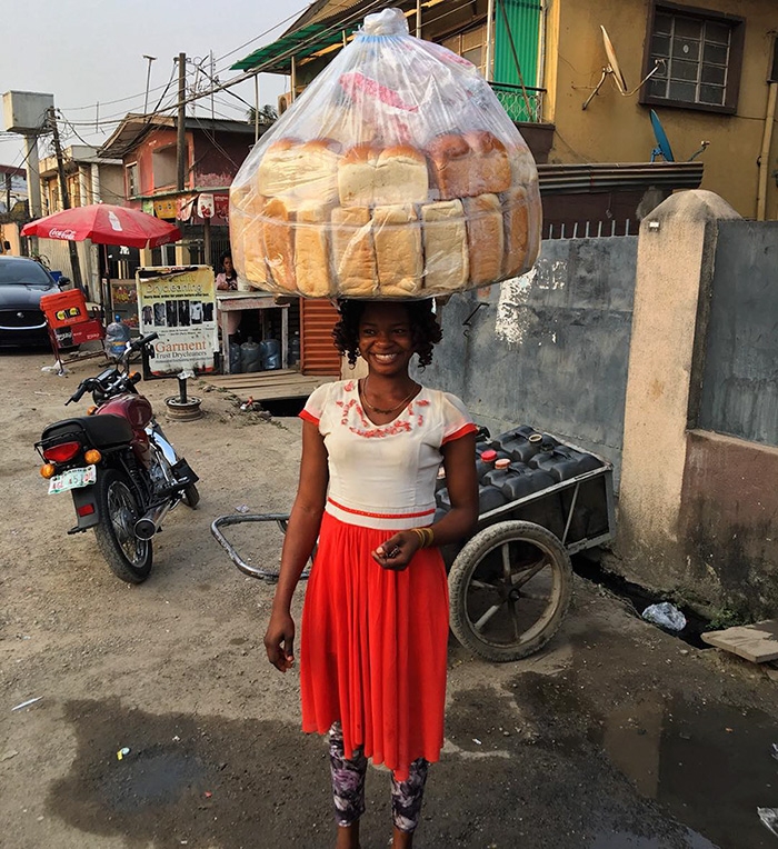 nigerian-bread-seller-modeling-contract-photobomb-olajumoke-orisaguna-4