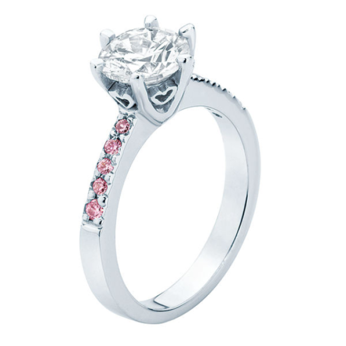 The ‘Ava’ featuring a round brilliant diamond offset with beautiful Pink Sapphires