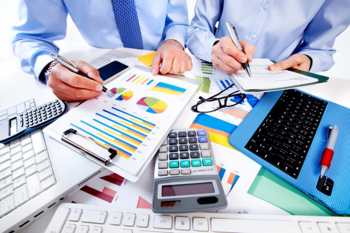 Hand with calculator. Finance and accounting business.
