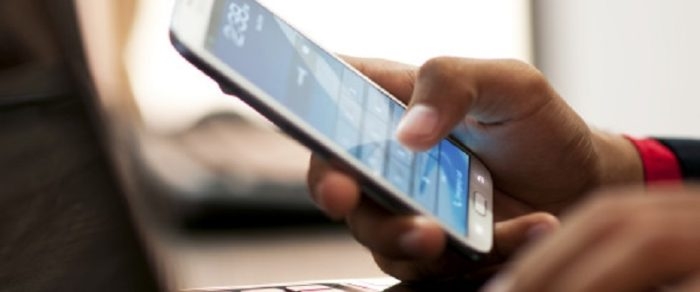 Businessman using smart phone