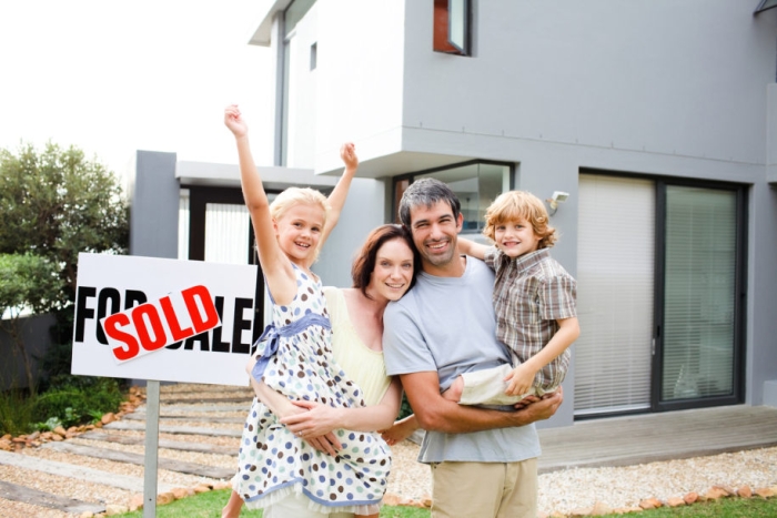 Happy family buying a house