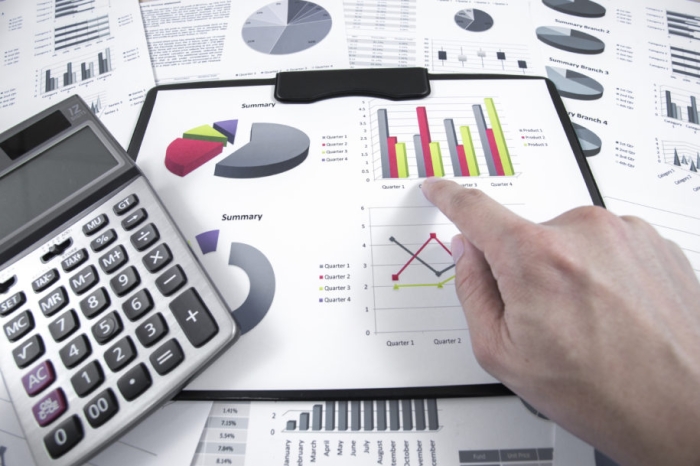 man hand with pen and business report