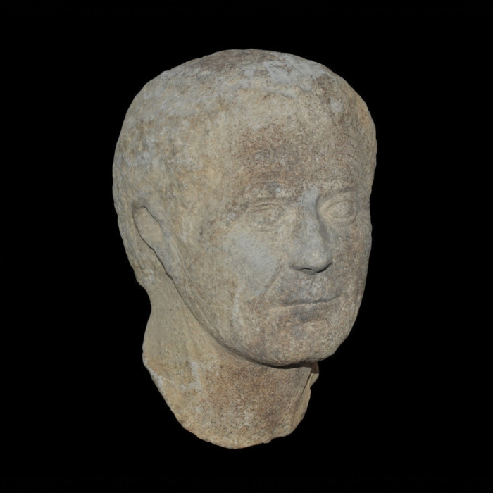 COLOSSAL EARLY ROMAN PORTRAIT HEAD OF A MAN