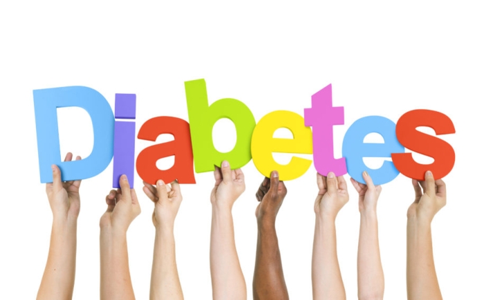 Multi-Ethnic Group Of Diverse People Holding Letters That Form Diabetes