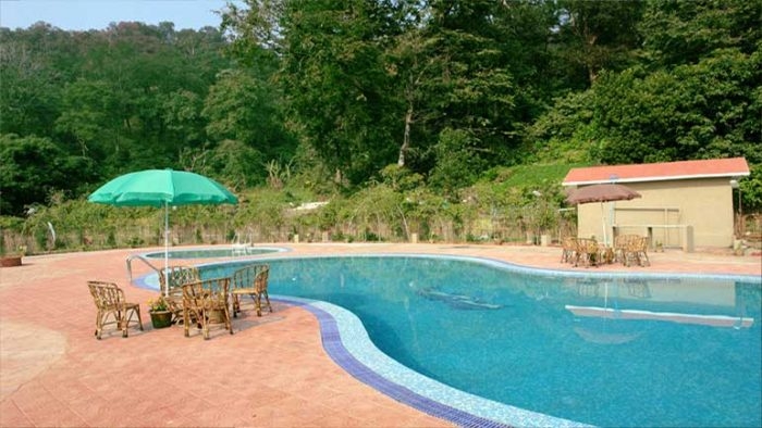 Swimming pool of Tiger Den Resorts