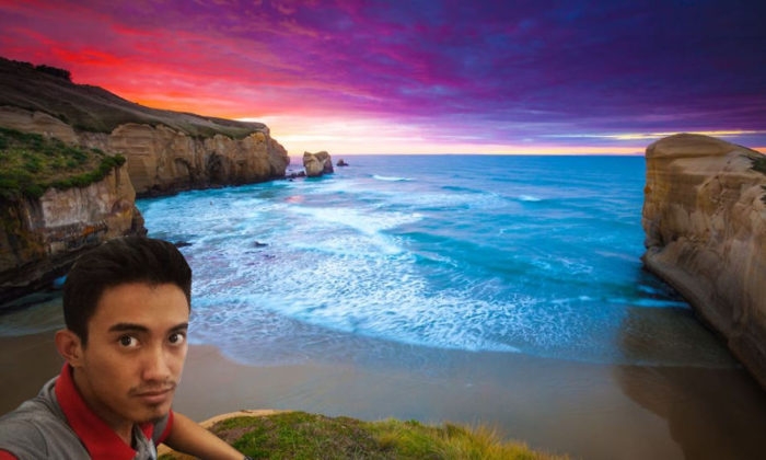 Colorful sunrise over Tunnel beach