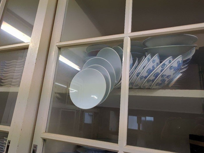 falling-plates-cupboard-advice-baoliao-commune-tseng-shao-tsen-org